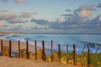 Sunrise on Ellenbogen beach, breakwater, coastal protection, North Sea island of Sylt