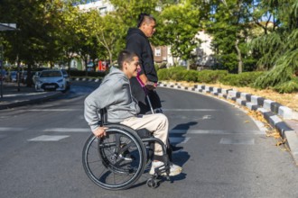 Two diverse young individuals with disabilities walking on a city road, one person using a