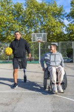 Two physically challenged men spending time together on a basketball court, one in a wheelchair and
