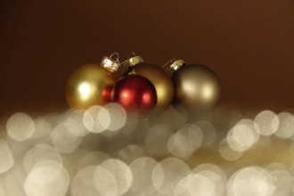 Still life with Christmas tree baubles and beautiful bokeh, Germany