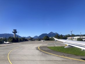 View of the tower and the Hochstaufen, Salzburger Land, Austria, from the aircraft on take-off from