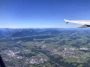View from the aeroplane of Freilassing and the north of Salzburg with the Chiemgau Alps and the
