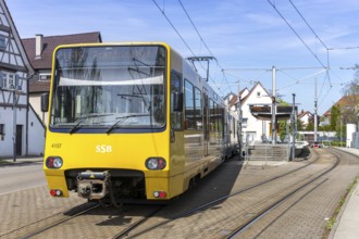 Stuttgart light rail vehicle type DT 8 public transport on line U15 at the Stammheim stop in