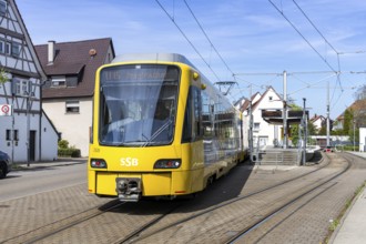 Stuttgart light rail vehicle type DT 8 public transport on line U15 at the Stammheim stop in