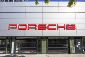 Porsche logo at the Porsche Centre Autohaus am Pragsattel in Stuttgart, Germany
