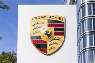 Porsche logo at the Porsche Centre Autohaus am Pragsattel in Stuttgart, Germany