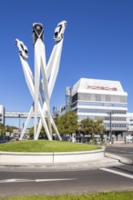 Porsche headquarters at Porscheplatz in Stuttgart-Zuffenhausen with artwork in Stuttgart, Germany