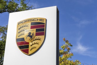 Porsche logo at the Porsche Centre Autohaus am Pragsattel in Stuttgart, Germany