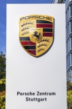 Porsche logo at the Porsche Centre Autohaus am Pragsattel in Stuttgart, Germany