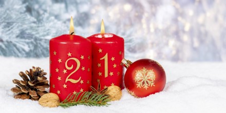 Second 2nd Advent candle for Christmas Christmas card in winter with text free space Copyspace