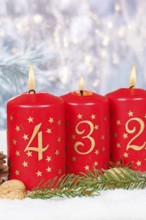 Fourth 4th Advent candle for Christmas Christmas card in winter with copy space Copyspace in