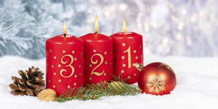 Third 3rd Advent candle for Christmas Christmas card in winter with text free space Copyspace