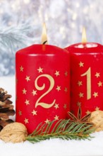 Second 2nd Advent candle for Christmas Christmas card in winter with copy space Copyspace in