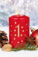 First 1st Advent candle for Christmas Christmas card in winter with copy space Copyspace in