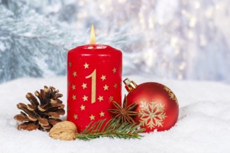 First 1st Advent candle for Christmas Christmas card in winter with copy space Copyspace in