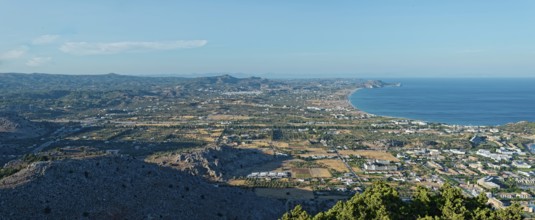 Expansive coastal landscape of Kolymbia and Faliraki, with mountain ranges and coastline under a