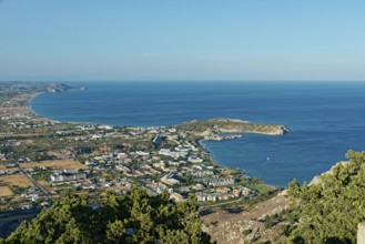Coastal landscape of Kolymbia and Faliraki, with a view of the sea and town in the foreground under