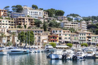 Port de Soller town on Majorca holiday by the sea yacht harbour with boats trip in Port de Sóller,