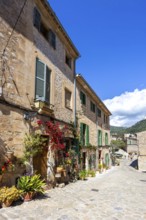 Valldemossa village on Majorca building with flowers trip in Valldemossa, Spain