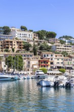Port de Soller town on Majorca holiday by the sea yacht harbour with boats trip in Port de Sóller,