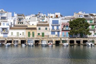 Colourful houses in Portocolom Fishing village on Majorca with boats Seaside holiday in Portocolom,