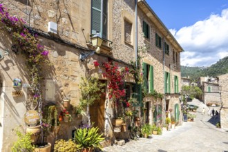 Valldemossa village on Majorca building with flowers trip in Valldemossa, Spain