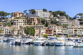 Port de Soller town on Majorca holiday by the sea yacht harbour with boats trip in Port de Sóller,