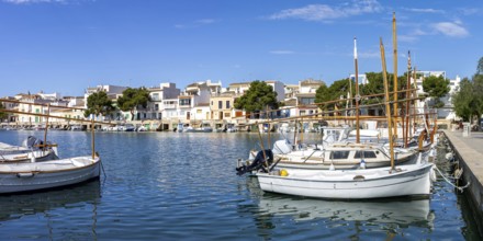 Portocolom fishing village on Majorca with boats and colourful houses Holiday by the sea Panorama