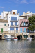 Colourful houses in Portocolom Fishing village on Majorca with boats Seaside holiday in Portocolom,