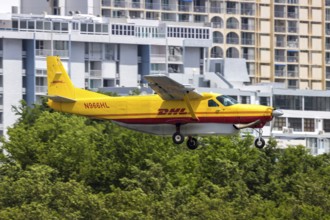 A DHL Cessna 208B Grand Caravan aircraft with licence plate N966HL at San Juan Airport, Puerto Rico