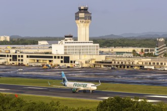 A Frontier Airlines Airbus A320 aircraft with the registration number N238FR at San Juan Airport,