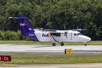 A FedEx Feeder Cessna 408 Skycourier aircraft with registration N758FX at San Juan Airport, Puerto
