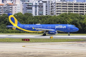 A JetBlue Airways Airbus A320 aircraft with the registration N775JB and the JetBlue Honours our