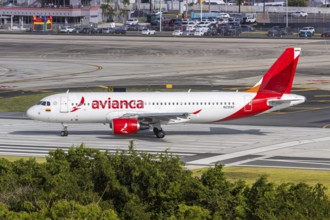 An Avianca Airbus A320 aircraft with registration number N230AC at San Juan Airport, Puerto Rico