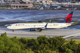 A Boeing 737-900ER aircraft of Delta Air Lines with the registration number N848DN at San Juan