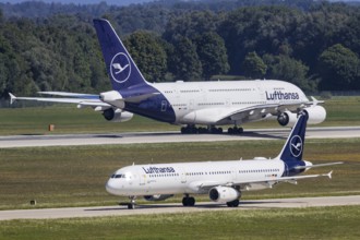 Airbus A380 and A321 aircraft of Lufthansa with the registration D-AIDX at Munich Airport, Germany