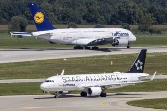 Airbus A320 and A380 aircraft of Lufthansa with the registration D-AIZN at Munich Airport, Germany