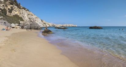 Quiet Tsambika beach with rocks, blue sea and clear sky, Tsambika beach, Archaggelos, Rhodes