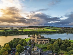 Sunset over Linlithgow Palace from a drone, Linlithgow Loch, West Lothian, Scotland, United Kingdom