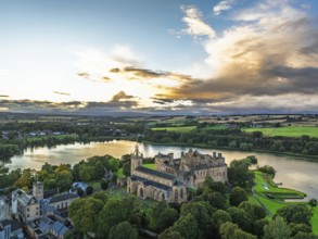 Sunset over Linlithgow Palace from a drone, Linlithgow Loch, West Lothian, Scotland, United Kingdom