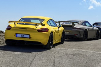 Sports car for public traffic Road-approved road version of racing car with rear wing spoiler with