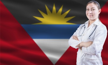 Female doctor on Antigua and Barbuda flag. Doctor with crossed arms on Antigua and Barbuda flag.