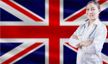 Female doctor on United Kingdom flag. Doctor with crossed arms on United Kingdom flag. United