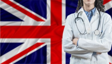 Medical professional on United Kingdom flag. Healthcare and wellness in United Kingdom, Concept