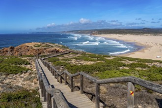Viewpoint above the beach Praia da Bordeira, near Carrapateira, wooden walkway, rocky coast, steep