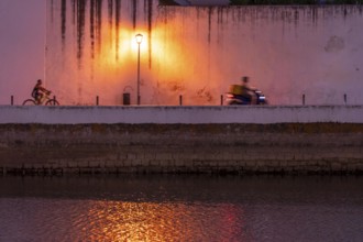 Evening in the old town centre, by the Gilao River, Tavira, in the Algarve, Portugal