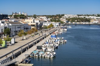 The old town centre of Tavira, on the Gilao River, boats, fishing boats, waterfront promenade, in