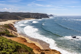 Praia do Amado beach near Carrapateira, popular with surfers, wave riders, rocky coast, steep coast