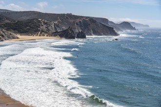 Praia do Amado beach near Carrapateira, popular with surfers, wave riders, rocky coast, steep coast
