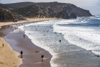 Praia do Amado beach near Carrapateira, popular with surfers, wave riders, rocky coast, steep coast